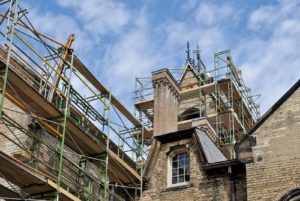 Scaffolding against the historic building restoration project.