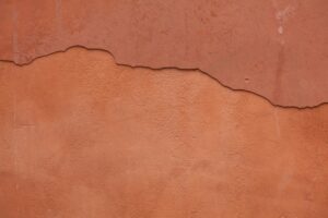How to repair terracotta commercial walls. A cracked terracotta wall slab.