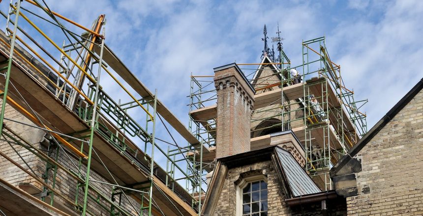 Scaffolding against the historic building restoration project.